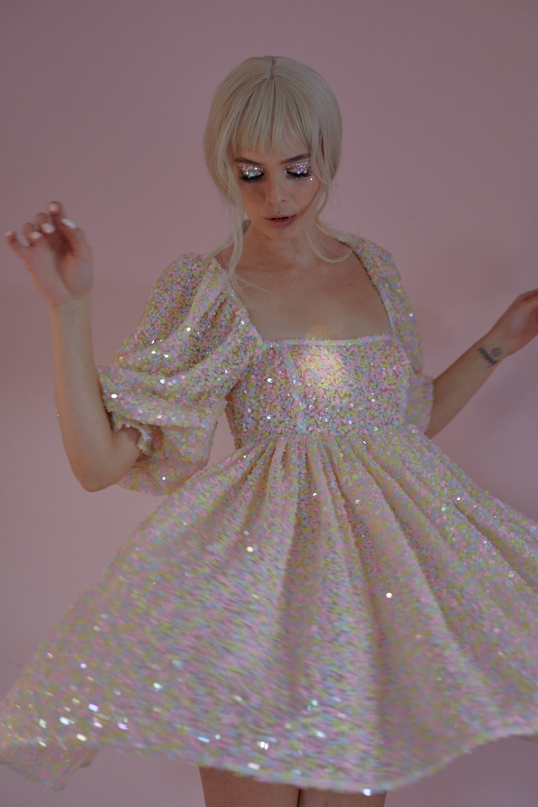 Shimmering Rainbow Sequin Puff for Parties
